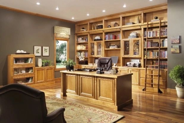 Elegant home office with built-in wood shelving