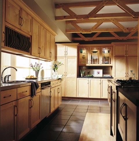 Traditional kitchen with natural wood cabinetry